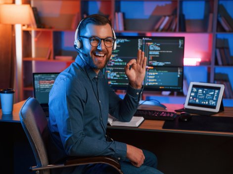 positive-professional-programmer-is-working-indoor-2023-11-27-04-50-22-utc